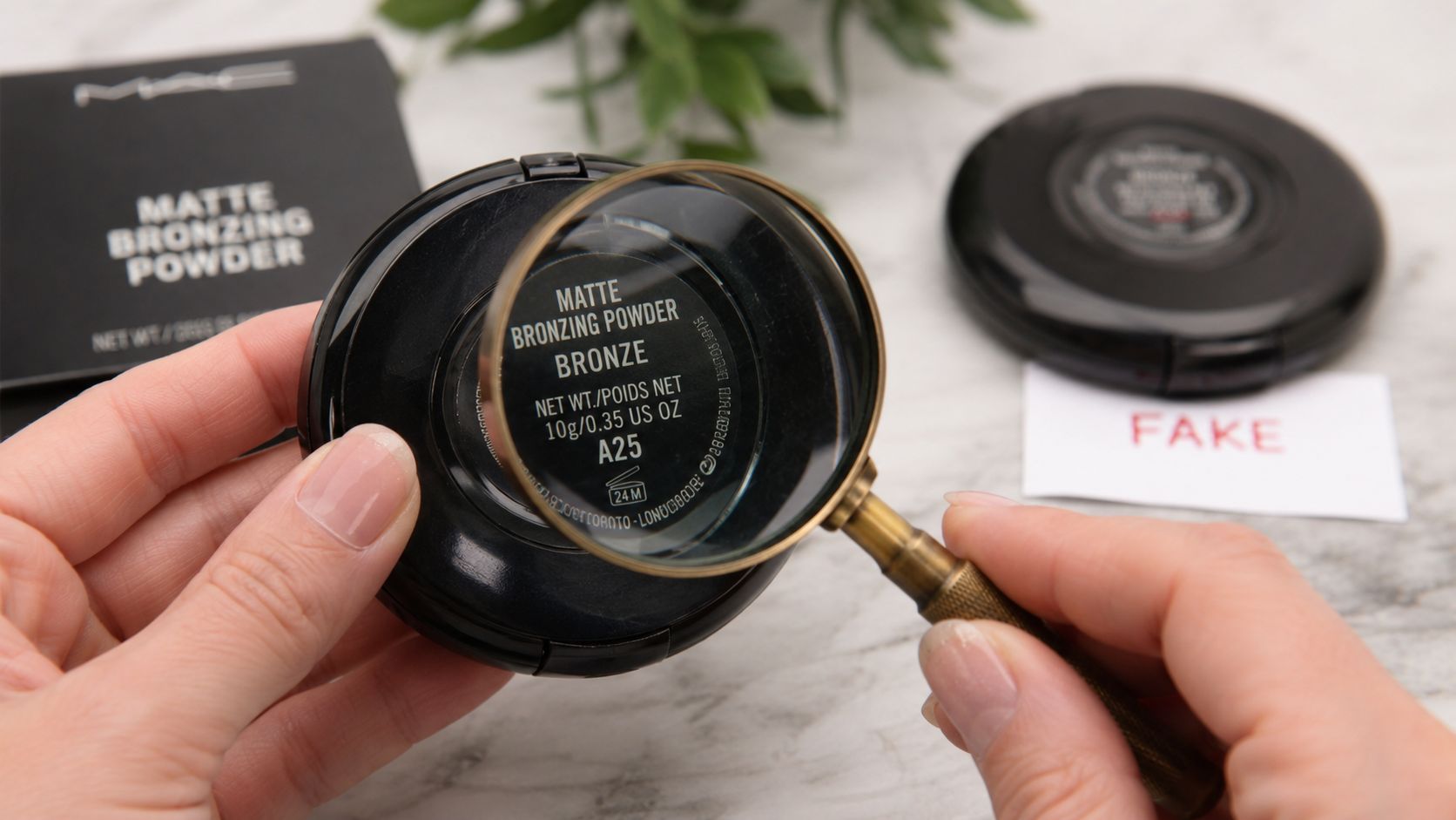 A close-up view of a MAC bronzing powder compact being examined under a vintage magnifying glass.